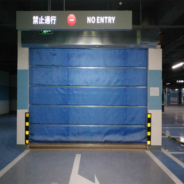 防火卷簾一步降和兩步降怎樣設(shè)置(圖1) 地下車庫的防火卷簾門.jpg